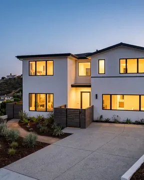 A rebuilt single-family home, finished exterior in daylight.