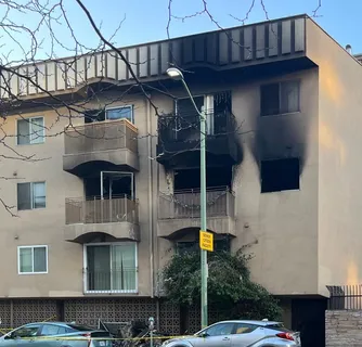 Fire-damaged apartment building exterior